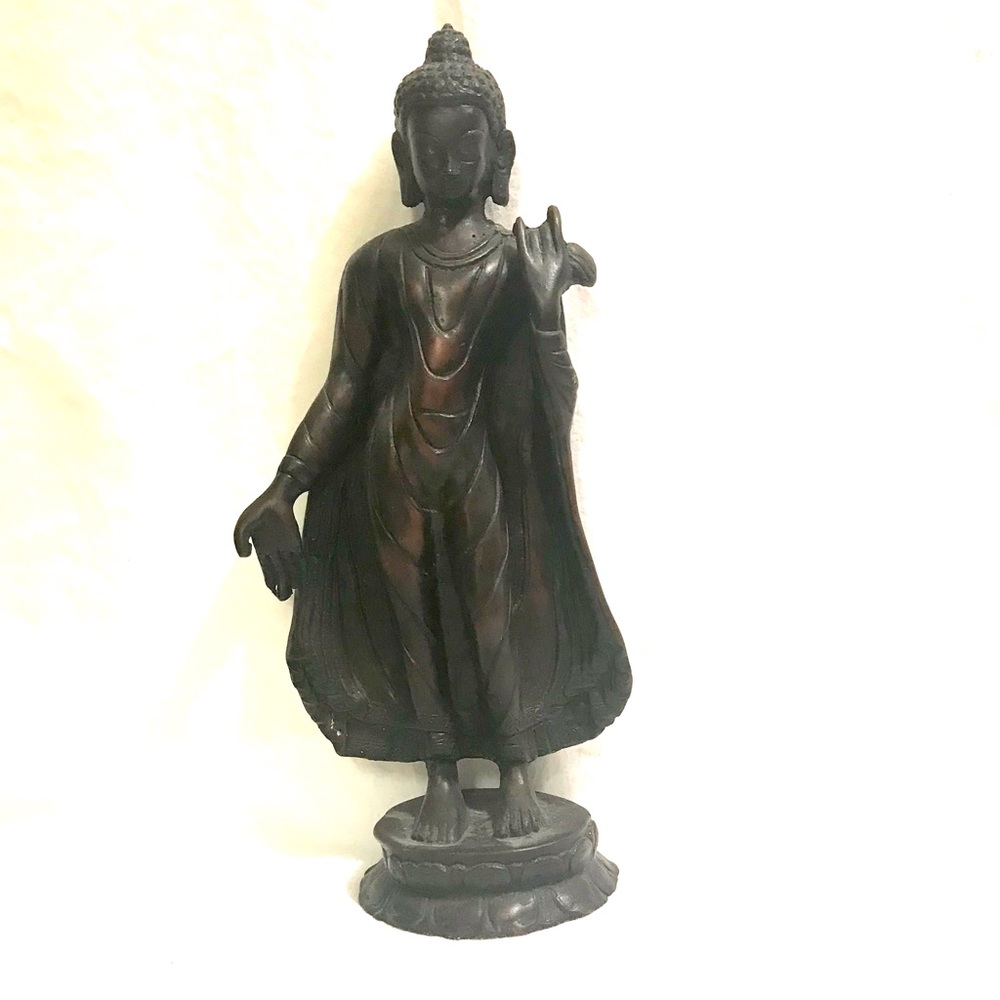 Siddhartha/Buddha Posing as a young Man with Robe.